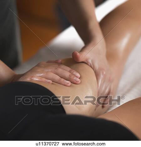 Stock Photo - Legs Sports Massage Therapy. Fotosearch