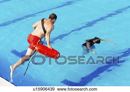 Stock Photo - Lifeguard in action. Fotosearch