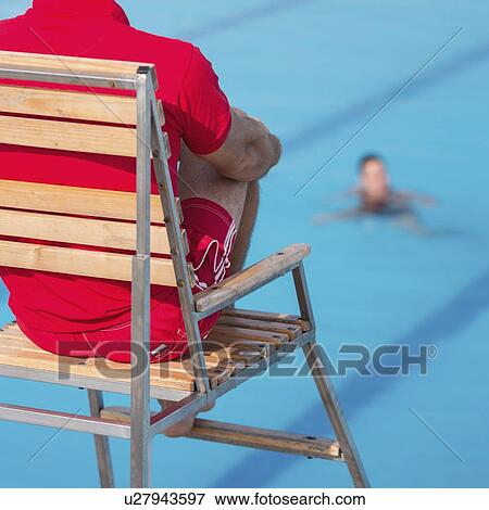 Stock Photo - Lifeguard in chair. Fotosearch