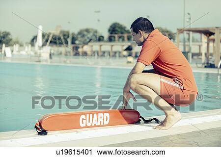 Stock Image - Lifeguard on duty. Fotosearch