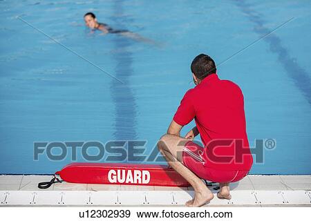 Lifeguard on duty View Large Photo Image Stock Photo - Lifeguard on duty. Fotosearch