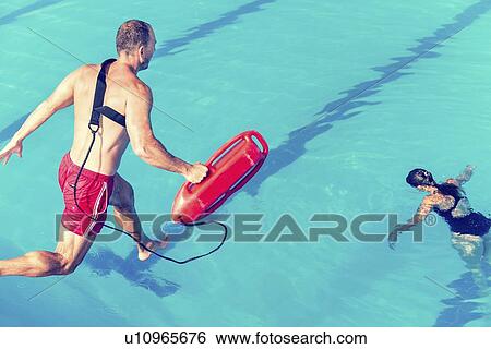 Stock Photograph - Lifeguard rescue course. Fotosearch