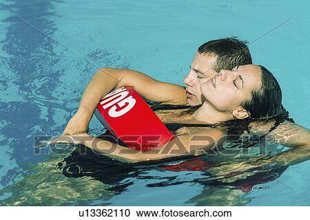 Stock Image - Lifeguard rescue. Fotosearch
