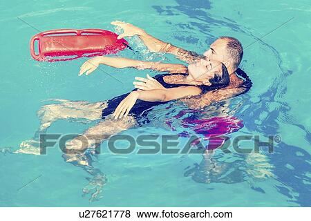 Lifeguard rescue View Large Photo Image Stock Photo - Lifeguard rescue. Fotosearch