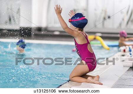 Little girl by side of pool View Large Photo Image Stock Photograph - Little girl by side of pool. Fotosearch