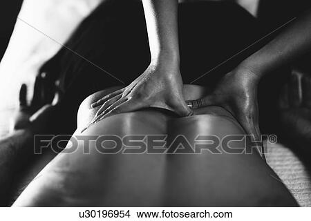 Lower back massage View Large Photo Image Picture - Lower back massage. Fotosearch