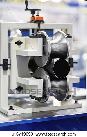 Stock Photo - Machine for production of downspout tubes. Fotosearch