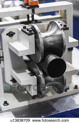 Machine for production of downspout tubes View Large Photo Image Stock Photo - Machine for production of downspout tubes. Fotosearch