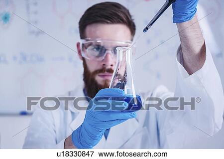 Male researcher in laboratory View Large Photo Image Stock Photo - Male researcher in laboratory. Fotosearch