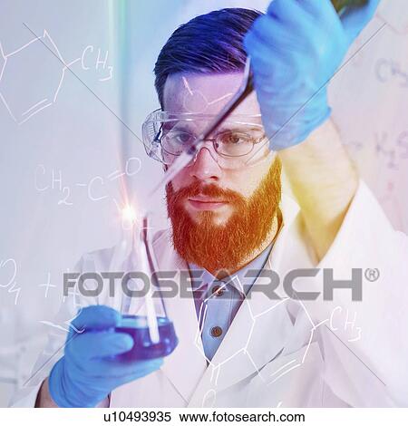 Stock Photography - Male researcher in laboratory. Fotosearch