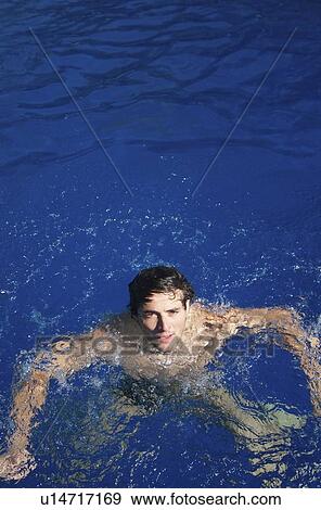 Stock Photo - Man in swimming pool. Fotosearch