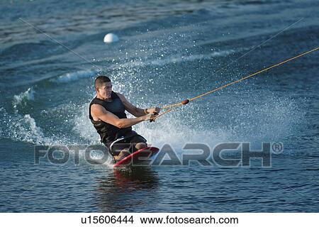 Man kneeboarding View Large Photo Image Picture - Man kneeboarding. Fotosearch