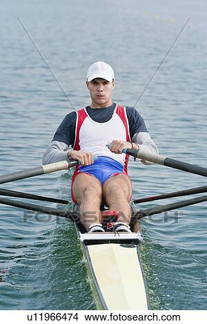 Picture - Man rowing scull. Fotosearch