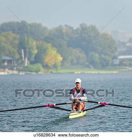 Picture - Man rowing scull. Fotosearch