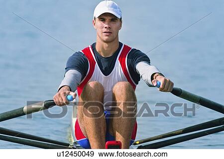 Stock Photo - Man rowing scull. Fotosearch