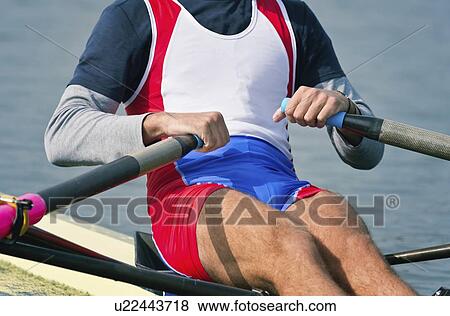 Stock Photo - Man rowing scull. Fotosearch