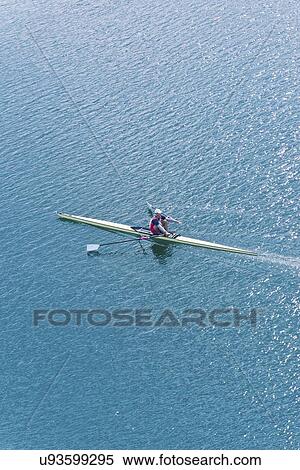 Stock Photography - Man rowing scull. Fotosearch