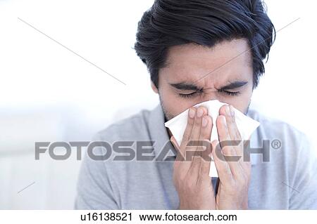 Man sneezing View Large Photo Image Stock Image - Man sneezing. Fotosearch
