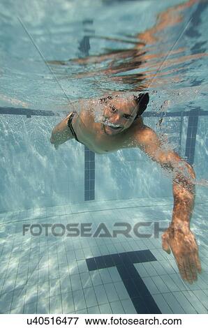 Stock Photo - Man swimming. Fotosearch