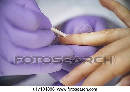 Stock Photograph - Manicuring nails. Fotosearch