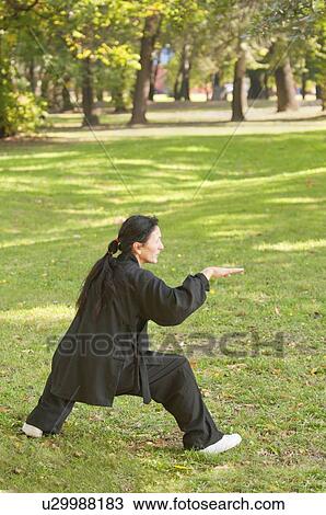 Stock Image - Martial arts practice. Fotosearch