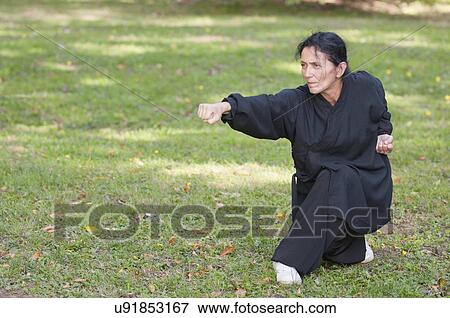 Stock Photo - Martial arts practice. Fotosearch