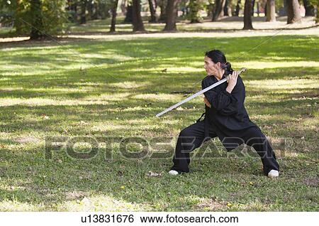 Martial arts sword practice View Large Photo Image Stock Photograph - Martial arts sword practice. Fotosearch