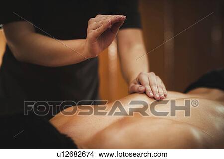 Picture - Massage therapy. Fotosearch