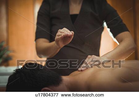 Massage therapy View Large Photo Image Stock Photo - Massage therapy. Fotosearch