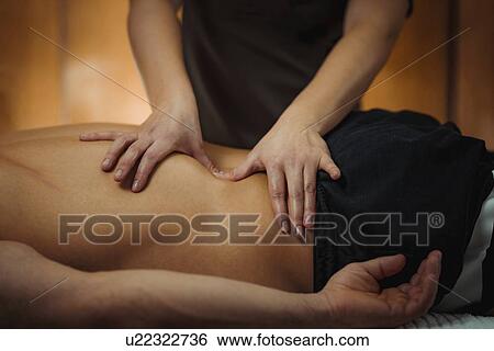 Stock Photograph - Massage therapy. Fotosearch