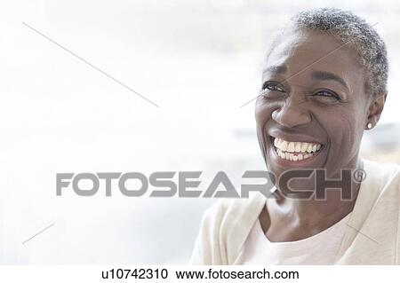 Mature woman smiling View Large Photo Image Stock Image - Mature woman smiling. Fotosearch