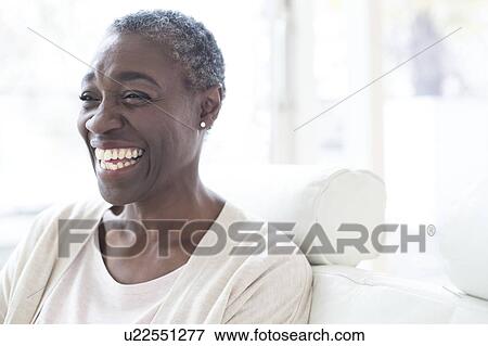 Stock Photo - Mature woman smiling. Fotosearch