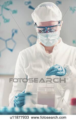 Microbiologist working in laboratory View Large Photo Image Stock Image - Microbiologist working in laboratory. Fotosearch
