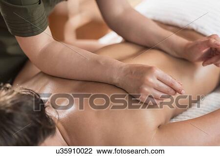 Stock Image - Neck massage. Fotosearch