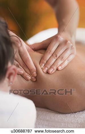 Stock Photo - Neck massage. Fotosearch