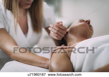Neck massage View Large Photo Image Stock Photo - Neck massage. Fotosearch