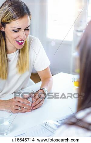 Nutritionist with female patient View Large Photo Image Picture - Nutritionist with female patient. Fotosearch