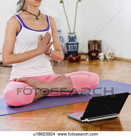 Online yoga class View Large Photo Image Picture - Online yoga class. Fotosearch