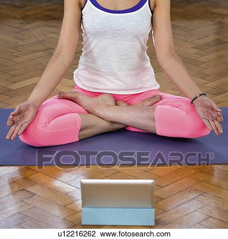 Online yoga class View Large Photo Image Stock Image - Online yoga class. Fotosearch
