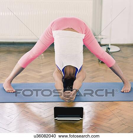 Online yoga class View Large Photo Image Stock Image - Online yoga class. Fotosearch
