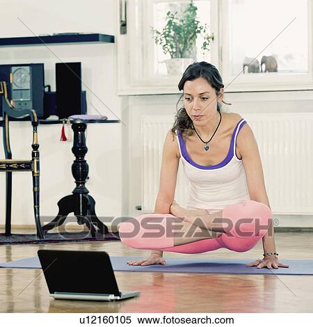 Stock Photography - Online yoga class. Fotosearch