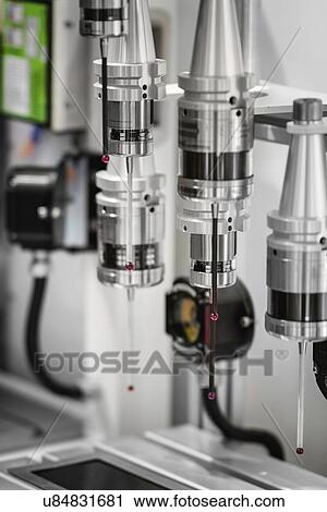 Stock Image - Optical probing systems for CNC machine tools. Fotosearch