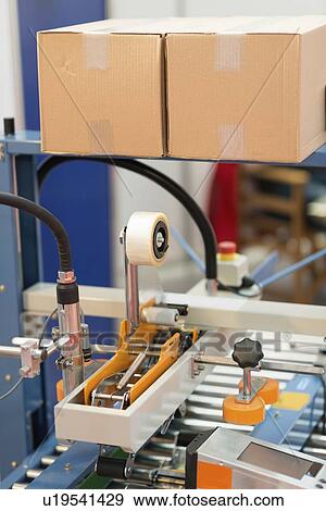 Packing machine View Large Photo Image Stock Photo - Packing machine. Fotosearch