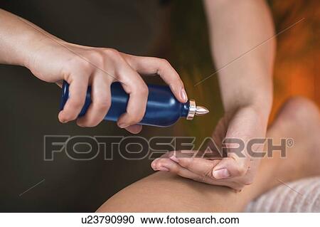 Physiotherapist applying massage oil View Large Photo Image Stock Image - Physiotherapist applying massage oil. Fotosearch