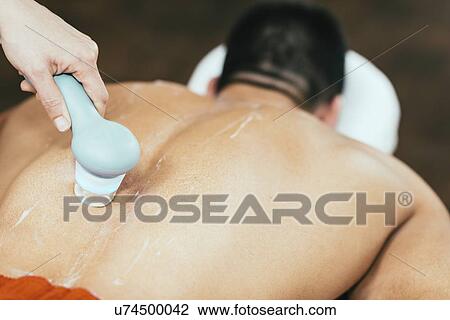 Physiotherapist using ultrasound View Large Photo Image Stock Image - Physiotherapist using ultrasound. Fotosearch