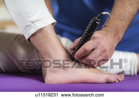 Physiotherapy laser treatment View Large Photo Image Stock Image - Physiotherapy laser treatment. Fotosearch