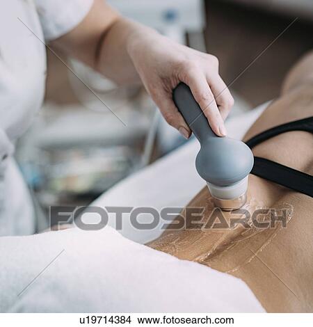 Physiotherapy ultrasound treatment View Large Photo Image Picture - Physiotherapy ultrasound treatment. Fotosearch