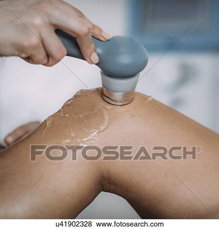 Physiotherapy ultrasound treatment View Large Photo Image Stock Photo - Physiotherapy ultrasound treatment. Fotosearch