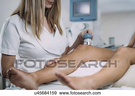 Physiotherapy ultrasound treatment View Large Photo Image Stock Photo - Physiotherapy ultrasound treatment. Fotosearch
