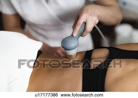 Physiotherapy ultrasound treatment View Large Photo Image Stock Photograph - Physiotherapy ultrasound treatment. Fotosearch